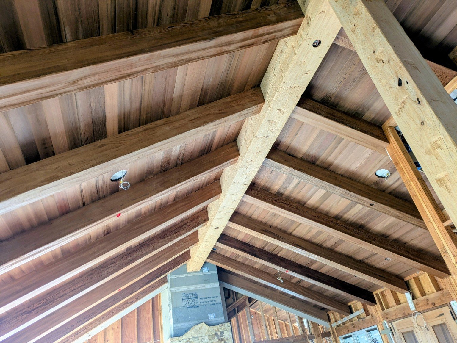 Custom wood ceiling and beam work by Shalom Construction